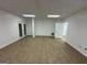 Basement with neutral tile, double doors, and a separate entrance door at 172 Oak Forest Se Dr, Smyrna, GA 30082