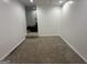 Finished basement with carpeted floors and a peek into a room with recliners at 172 Oak Forest Se Dr, Smyrna, GA 30082