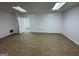 Basement offering neutral tile, an entry door, and natural light from a window at 172 Oak Forest Se Dr, Smyrna, GA 30082