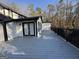 Expansive deck perfect for outdoor entertaining with wooded views at 172 Oak Forest Se Dr, Smyrna, GA 30082