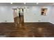 Bright dining room featuring hardwood floors, pendant lighting and access to other rooms at 172 Oak Forest Se Dr, Smyrna, GA 30082