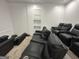Home theater features comfortable recliners, perfect for movie nights and entertainment at 172 Oak Forest Se Dr, Smyrna, GA 30082