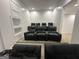 Finished home theater features tiered seating and comfortable recliners, perfect for entertainment at 172 Oak Forest Se Dr, Smyrna, GA 30082