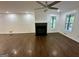 Spacious living room featuring a dark wood fireplace, hardwood floors, and plenty of natural light at 172 Oak Forest Se Dr, Smyrna, GA 30082