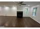 Living room featuring hardwood floors, a fireplace, and bright natural light at 172 Oak Forest Se Dr, Smyrna, GA 30082