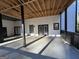 Covered deck featuring a cement floor and white wooden walls at 172 Oak Forest Se Dr, Smyrna, GA 30082