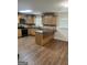 Bright kitchen with modern appliances, wooden cabinets and an island at 113 Ausband Dr, Mcdonough, GA 30253