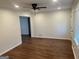 Spacious living room featuring hardwood floors and lots of natural light at 113 Ausband Dr, Mcdonough, GA 30253