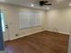 Inviting living room featuring fresh paint, new floors, and ample natural light at 113 Ausband Dr, Mcdonough, GA 30253