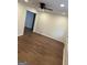 Spacious living room with new flooring, fresh paint, fan and recessed lighting, creating a welcoming space at 113 Ausband Dr, Mcdonough, GA 30253