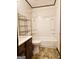 Cozy bathroom featuring a combined tub and shower at 6698 Cameron Rd, Morrow, GA 30260
