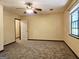 Bright bedroom with carpet, ceiling fan and natural light at 6698 Cameron Rd, Morrow, GA 30260