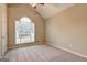 Bedroom with carpeted floors, arched window and lots of space at 221 Ashley Oaks Dr, Mcdonough, GA 30253