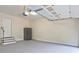 Attached two-car garage includes stairs to home, refrigerator, and garage door opener at 221 Ashley Oaks Dr, Mcdonough, GA 30253