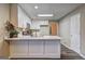 Updated kitchen featuring white cabinetry, a large island, and modern appliances at 221 Ashley Oaks Dr, Mcdonough, GA 30253