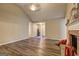 Spacious living room with vaulted ceilings, a fireplace, and neutral tones perfect for relaxation at 221 Ashley Oaks Dr, Mcdonough, GA 30253