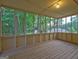 Large screened porch offering a peaceful outdoor retreat at 221 Ashley Oaks Dr, Mcdonough, GA 30253