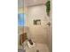 Modern tiled shower with bench and niche, complemented by stylish fixtures at 221 Ashley Oaks Dr, Mcdonough, GA 30253