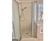 Modern tiled shower with glass door at 410 Oakpark Ter, Mcdonough, GA 30253
