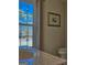 Bathroom features a large window with a view and a modern sink and toilet at 809 Mcbean Ct, Mcdonough, GA 30252