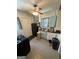 Functional kitchen with appliances, wooden stool, and tiled flooring at 1730 Emerald Sw Ave, Atlanta, GA 30310
