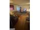 Cozy living room with hardwood floors, multiple seats and TV at 1730 Emerald Sw Ave, Atlanta, GA 30310
