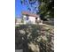 A house's backyard features a spacious yard and wooden fence at 1132 Se Oak Knoll Ter, Atlanta, GA 30315
