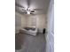Bright bedroom featuring comfortable seating, neutral decor, and ample space for relaxation at 1132 Se Oak Knoll Ter, Atlanta, GA 30315