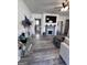 Open-concept living room features a fireplace, TV, and elegant decor in a stylish setting at 1132 Se Oak Knoll Ter, Atlanta, GA 30315