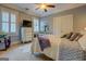 Bedroom featuring a bed, dresser, and windows, creating a relaxing retreat at 4128 Hunt Sw St, Covington, GA 30014