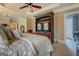 Comfortable bedroom with a TV, large bed and neutral décor at 4128 Hunt Sw St, Covington, GA 30014