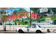 Vibrant city mural celebrating local history and culture, adding a unique touch to the community at 4128 Hunt Sw St, Covington, GA 30014