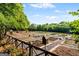 Picturesque community garden with raised beds and walking paths, providing a serene space for gardening enthusiasts at 4128 Hunt Sw St, Covington, GA 30014