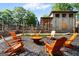 Cozy outdoor fire pit area with comfortable seating, perfect for gatherings and enjoying the outdoors at 4128 Hunt Sw St, Covington, GA 30014