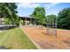 Community playground with a gazebo and swingset, perfect for Gathering fun and outdoor activities at 4128 Hunt Sw St, Covington, GA 30014