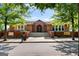Welcoming brick school entrance featuring prominent signage and well-maintained landscaping, ideal for a learning environment at 4128 Hunt Sw St, Covington, GA 30014