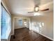 Bright living room featuring beautiful hardwood floors, with lots of natural light from large windows at 1901 Clarke Ln, Decatur, GA 30035