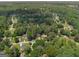 An aerial view showcases the neighborhood with tree-lined streets and well-maintained lawns at 2894 Cushing Ct, Jonesboro, GA 30236