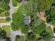 An aerial view of the house nestled among mature trees in a quiet, established neighborhood at 2894 Cushing Ct, Jonesboro, GA 30236