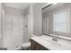 Bathroom features a modern vanity, toilet and a shower-tub combo at 2894 Cushing Ct, Jonesboro, GA 30236