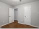 This bedroom features hardwood floors and access to another room at 2894 Cushing Ct, Jonesboro, GA 30236