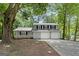 Charming two-story home featuring a covered porch, stone accents and a two car garage at 2894 Cushing Ct, Jonesboro, GA 30236