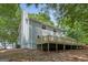 This is an exterior view of the back of the house and the deck at 2894 Cushing Ct, Jonesboro, GA 30236