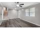 Spacious living room with staircase, laminate flooring, neutral walls, and natural light at 2894 Cushing Ct, Jonesboro, GA 30236
