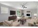 Bright living room with a fireplace, sliding glass door and recessed lighting at 2894 Cushing Ct, Jonesboro, GA 30236