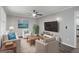Cozy living room with modern decor, plush seating, and a large TV for entertainment at 2894 Cushing Ct, Jonesboro, GA 30236