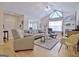 Bright and airy living room with vaulted ceilings, fireplace, and stylish furniture arrangement at 150 Butterton Ct, Fayetteville, GA 30214