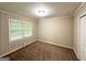 Cozy bedroom with carpet flooring and neutral walls at 2159 Holly Hill Dr, Decatur, GA 30032