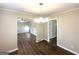 Bright dining room with hardwood floors, modern lighting, and easy access to other rooms at 2159 Holly Hill Dr, Decatur, GA 30032