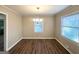 Dining area features hardwood flooring and a chandelier for warm lighting at 2159 Holly Hill Dr, Decatur, GA 30032